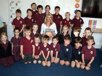 Pig tales leave pupils happy...