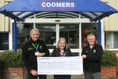 Coomers presents cheque to Hampshire and Isle of Wight Air Ambulance