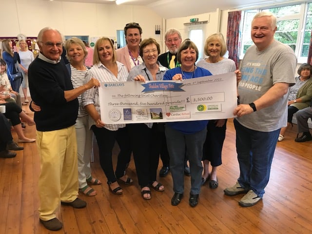 Cheque presentation to charities following Shalden village fete. Held at Shalden gardening club September 2022 meeting. From left: Ian Champness, Alex Gordon-Jones, Denise Ellis, Lisa Justice, Margaret Warren, Ryland Lee, Rosie Harle, Cynthia Buchanan and David Warwick.