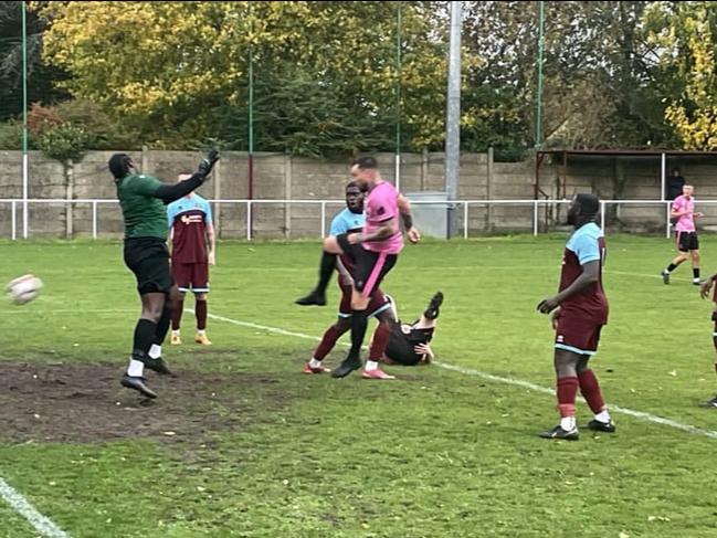 Ashley Lloyd heads Town’s third goal