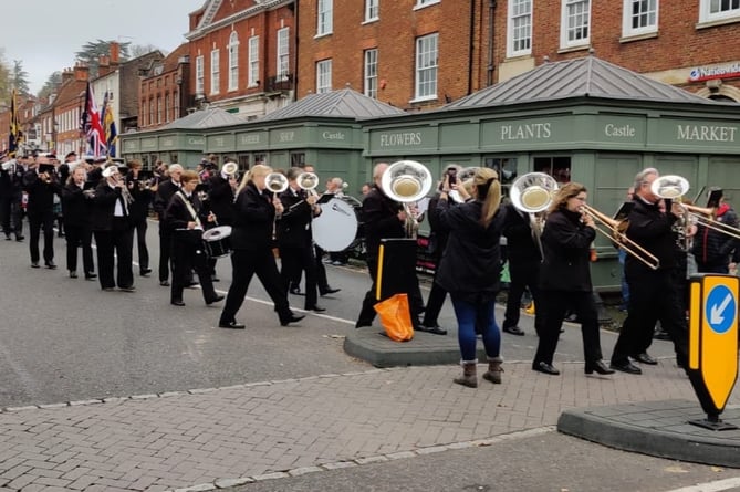 Alder Valley Brass Band lead Farnham’s Remembrance Day procession from Castle Street to the Gostrey Meadow war memorial