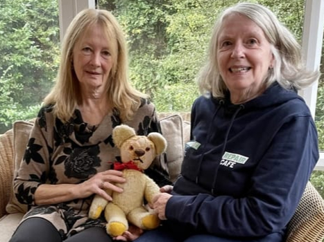Julia Brashier (left) receives her teddy from repairer Carol Hardcastle