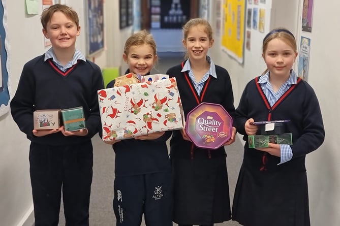 Alton School pupils donate Christmas presents to Alton Lions, December 2022. 