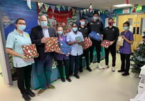Badshot Lea bring cheer to Frimley Park Hospital children's ward