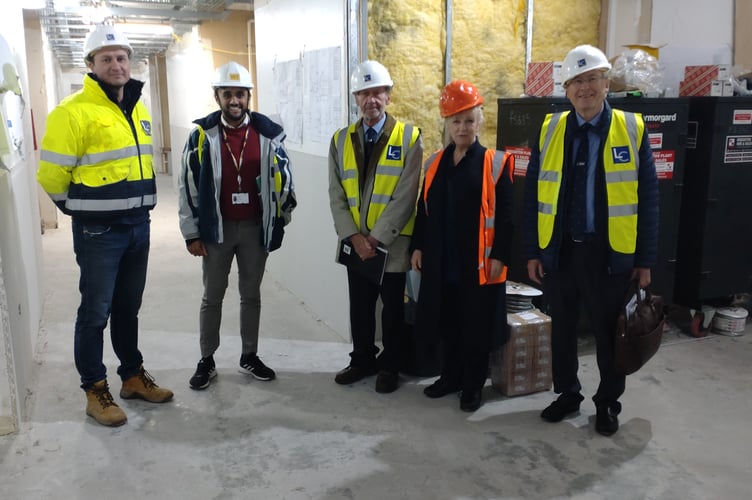 Farnham's Andrew Lodge (left) with fellow LIBDA trustees on their tour of King's College Hospital's new refurbished haematology unit