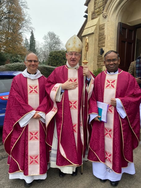 Bishop Richard with Father Jonathan (left) and Father Rajesh (right) outside Our Lady of Lourdes church