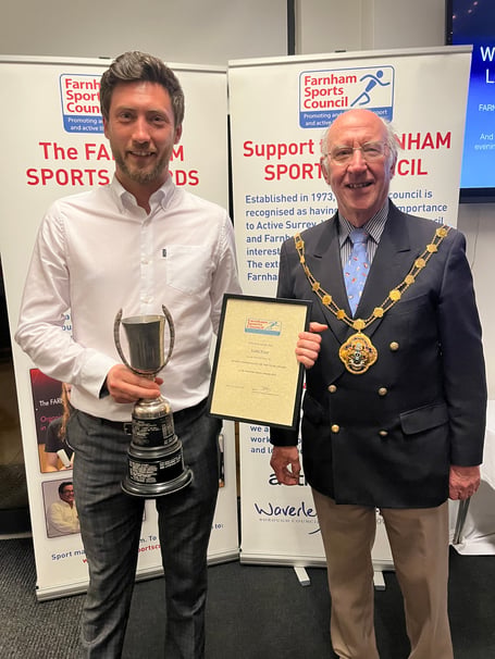 Luke Bone receives Lottie Woad's award on her behalf