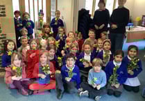 Children at All Saints CE Infant School in Tilford make posies for mum