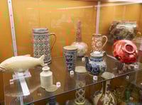 Researchers looking at ceramics collection at Allen Gallery in Alton