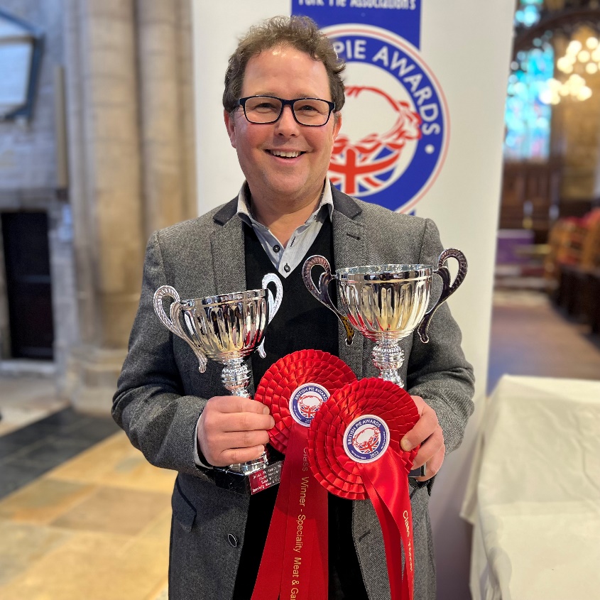 Christian Barrington with his two trophies at the awards ceremony