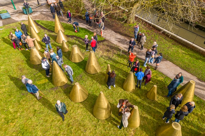 The mysterious golden cones first appeared at Riverside Walk opposite the Farnham Maltings around a month ago, but were only recently ‘launched’ by the mayor of Farnham, Alan Earwaker