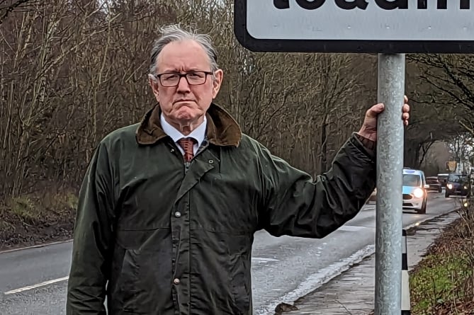 Andrew Jones with the 'unenforced' lorry ban sign