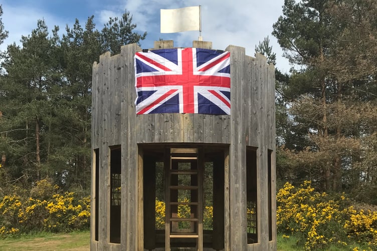 Union Flag on play area fort at Hogmoor Inclosure in Bordon for coronation, May 6th 2023.