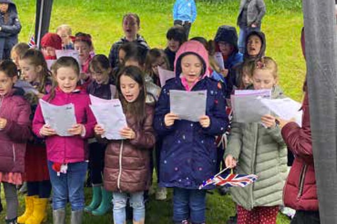 Children from Liss junior and infant schools sing coronation songs, May 6th 2023.