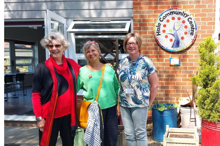 Norma Corkish, Denise Jacques and Cathy Burroughs unveil the mosaic