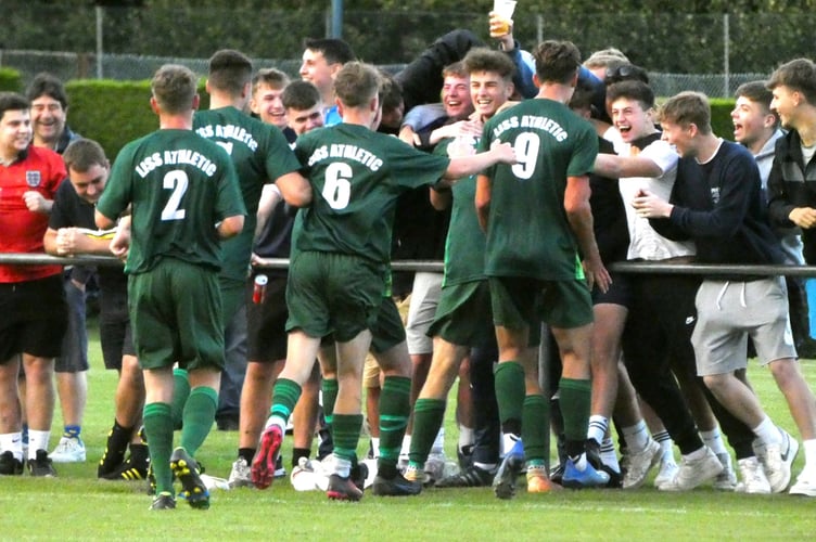 Liss Athletic players celebrate with their fans at Liphook United