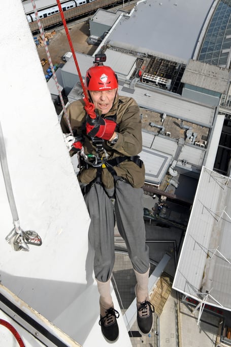 PETER WALKER SPINNAKER ABSEIL 

SPINNAKER TOWER, PORTSMOUTH, HAMPSHIRE
ENGLAND
AUGUST 2023

A 92-year-old Hampshire man undertook a charity abseil in memory of his journalist son who died in March of this year   
Hampshire's Peter Walker navigated his way down Portsmouthâs Spinnaker Tower accompanied by a professional abseiler to honour his son Jon who for many years had been the Chief Reporter at the Petersfield Post, Jon, who was 64, died just weeks after being diagnosed with terminal cancer

The Spinnaker Tower, known as 'The Sail of The Solent' is a 170 metre high observation overlooking the redevelopment of Portsmouth Harbour and the Gunwharf Quays retail complex below as well as offering a 'bird's eye view' of the adjoining Naval Base and across The Solent to the Isle of Wight 

During the summer months many people raise money for charities by experiencing the 100 metre descent and its associated adrenaline rush, but not many are 92 years of age ! 

Mr Walker Senior is aiming to raise money for Fitzroy, a charity often covered by his son which provides a range of services for adults with learning disability, autism and similar conditions.  Mr Walker, who is partially disabled and needed his doctorâs approval to undertake the challenge, said âMy son Jon was a legend because he loved Petersfield and its people and worked hard for them, for me, he is an inspiration....''I am self-sponsoring an abseil from the Spinnaker Tower to raise funds for, and to raise the profile of Fitzroy ''

Peter.....don't look down ! 

(Photo by Malcolm Wells)
 
Standard reproduction rates apply, contact Malcolm Wells to arrange payment - Mobile: 07802-217-569 
malcolmrichardwells@gmail.com
