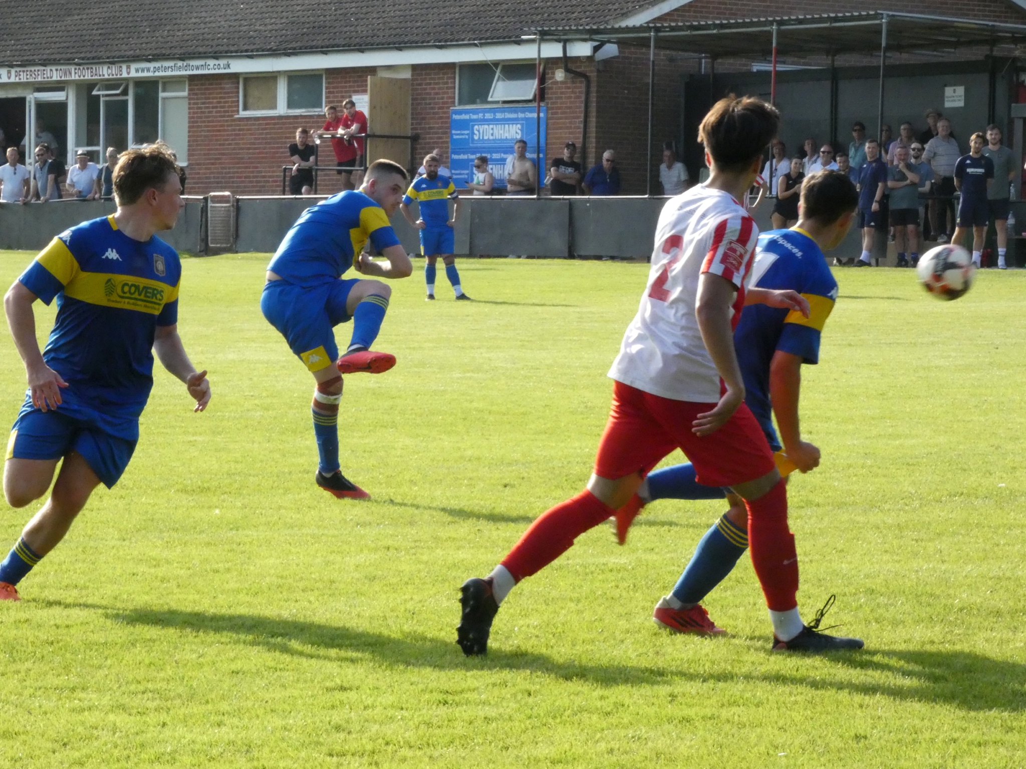 Tommy Tierney fires home Petersfield’s seventh goal