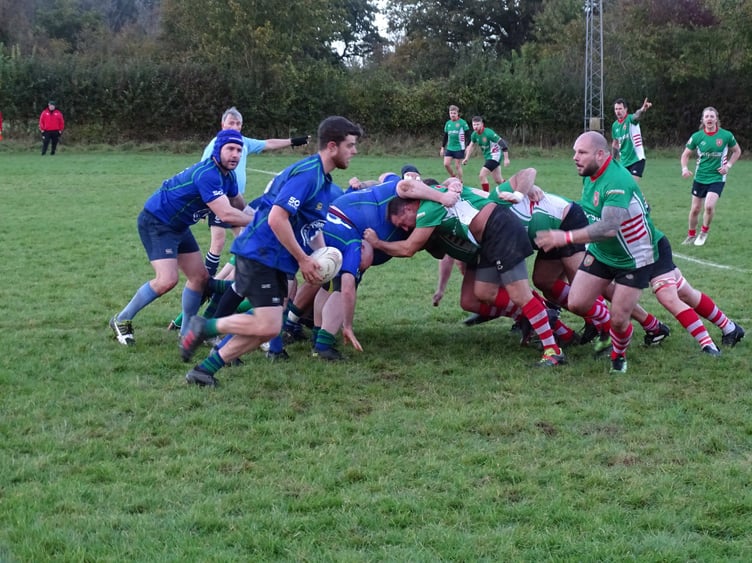 Lewis Bristow breaks from the flank to close down Overton