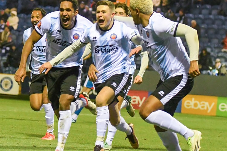 Olly Scott celebrates his winner at Stockport