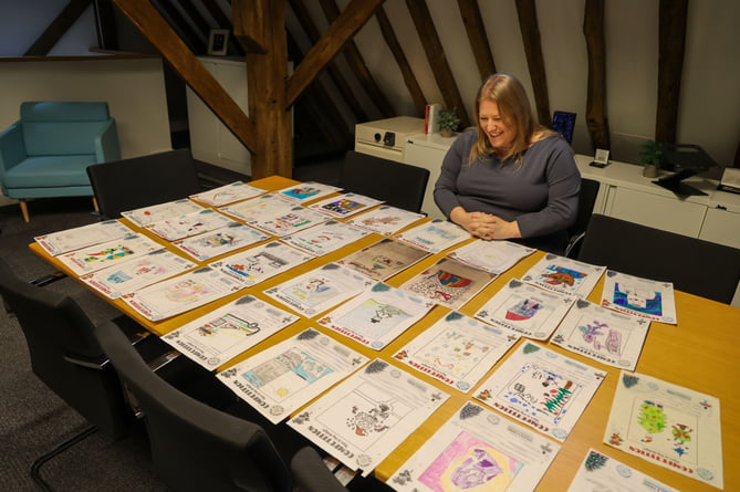Hampshire and Isle of Wight police and crime commissioner Donna Jones judges her Christmas card competition entries, December 2023.