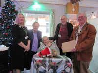 Haslemere's mayor visits Holy Cross Hospital for Christmas concert