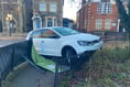 VIDEO: Car crashes into Farnham town centre barriers after hitting ice