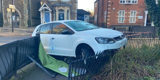 VIDEO: Car crashes into Farnham town centre barriers after hitting ice
