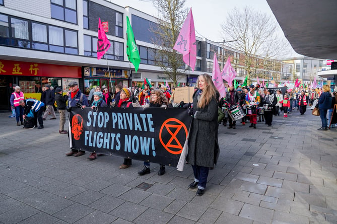 Around 1,000 people took part in Extinction Rebellion's march to Farnborough Airport on Saturday, January 27