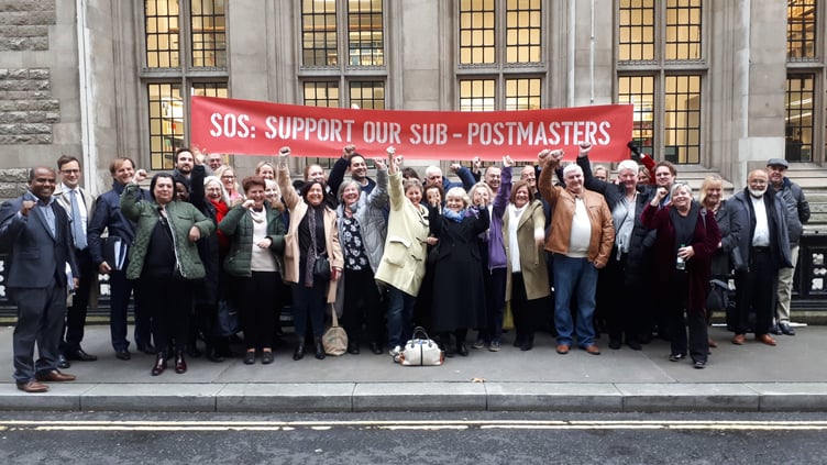Sub-postmasters celebrate at the High Court on December 16, 2019.