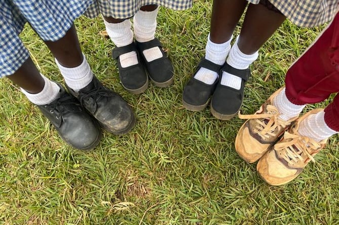 Kenyan school children with shoes from Liphook residents