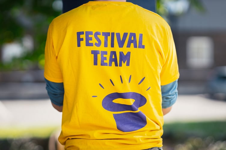 Hat Fair volunteer.
