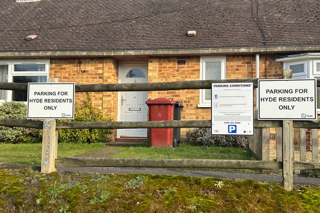 Residents rally against controversial village parking permit scheme