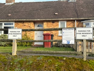Residents rally against controversial village parking permit scheme