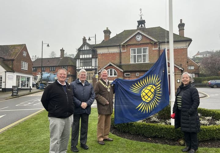 Cllr Jerome Davidson raises flag for Commonwealth Day