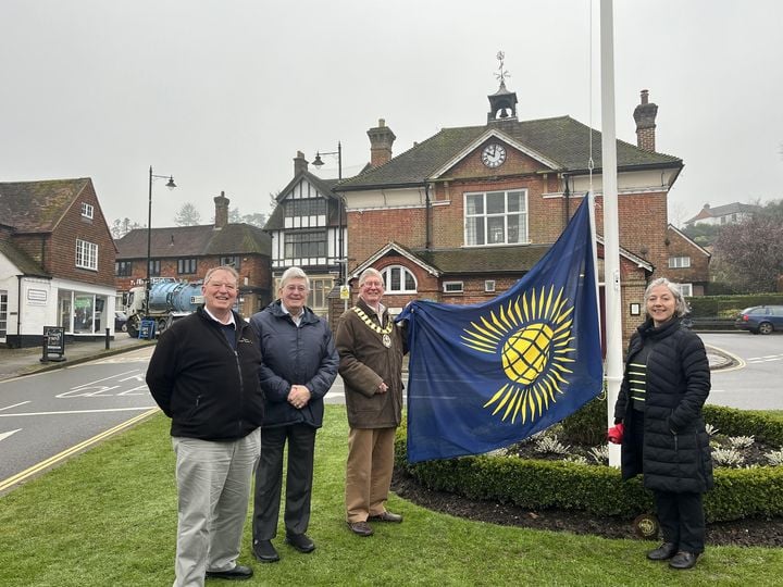 Cllr Jerome Davidson raises flag for Commonwealth Day
