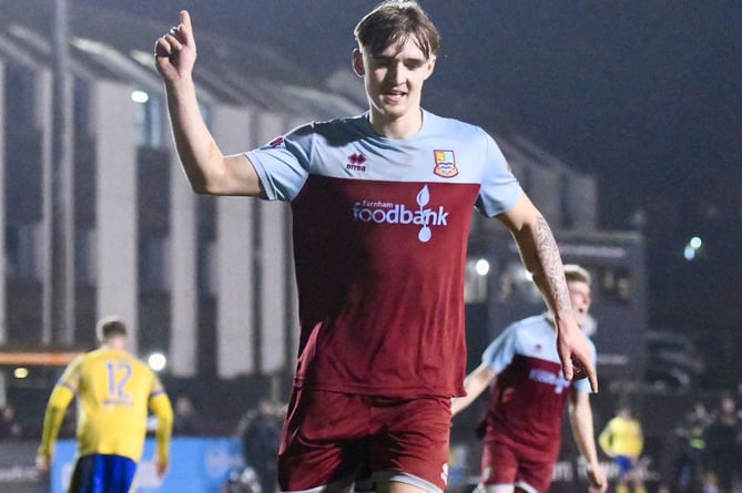 Owen Dean celebrates after scoring Farnham Town's second goal against Redhill
