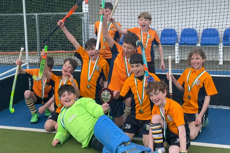 Alton Hockey Club's under-ten boys celebrate their success in Oxford