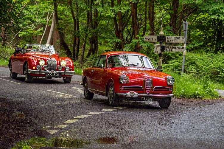 Oliver Peirson in his Alfa Romeo Giulietta Sprint and Chris Tyas in his Jaguar XK150 on the morning drive
