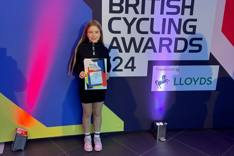 Four Marks BMX rider Betty Wills with her British Cycling award
