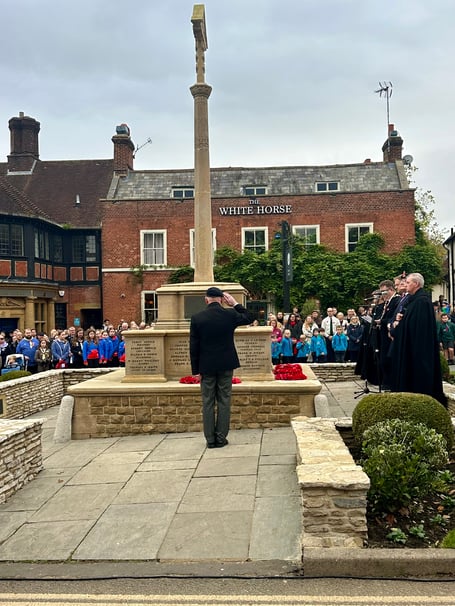 Veteran salutes Haslemere War Memorial during Remembrance Service