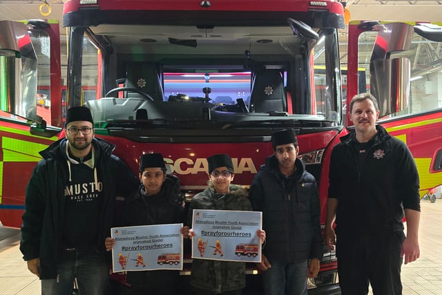 Muslim association distributes festive food to firefighters and police