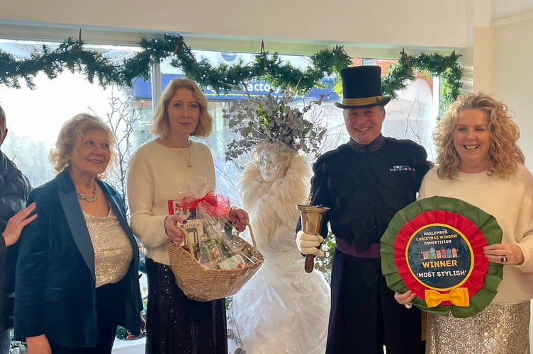 Charlotte Shefford and Naomi Robertson with Rev. Chris Bessant and Town Crier Christian Ashdown
