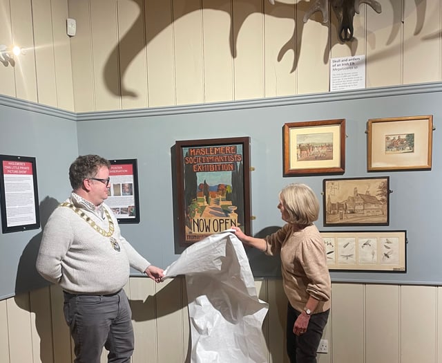 Rare 1910 poster restored for display at Haslemere Museum