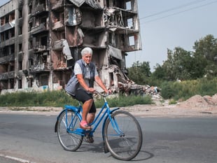 Yellow and blue Monday: Ukrainians mark a grim milestone