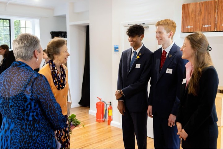 Hugo Kennedy, Head Boy in 2024/2025 welcoming School President Princess Anne to the school for a prize giving