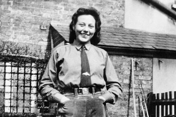 Monica Gudge in her Land Girl uniform, image credit: Rural Life Living Museum.