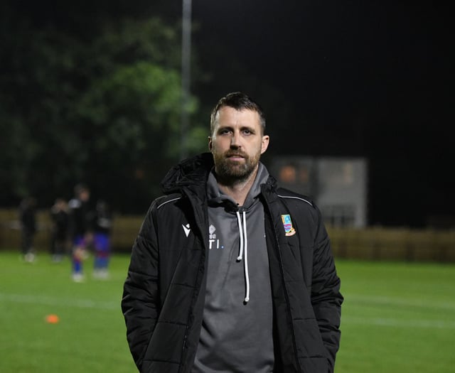 Town boss Johnson signs two-year contract