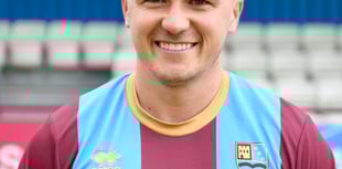 Town sign midfielder from National League South outfit