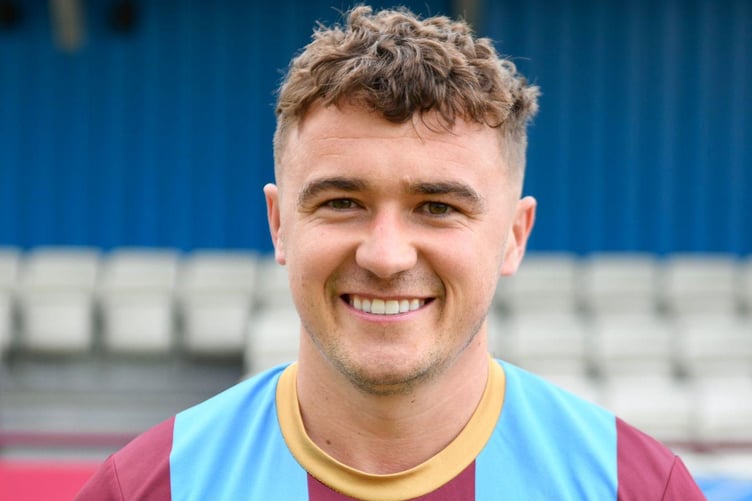 Farnham Town have signed Tom Leggett